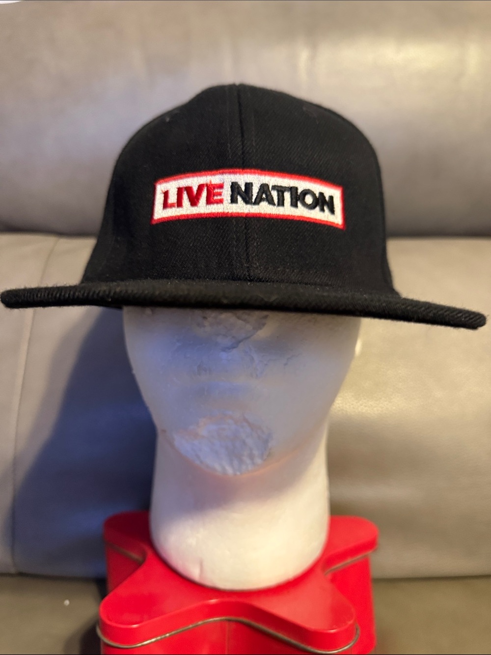 Live Nation Black Hat with Red & White Logo  under Armour hat